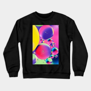 Colorful close up of oil drops in water Crewneck Sweatshirt